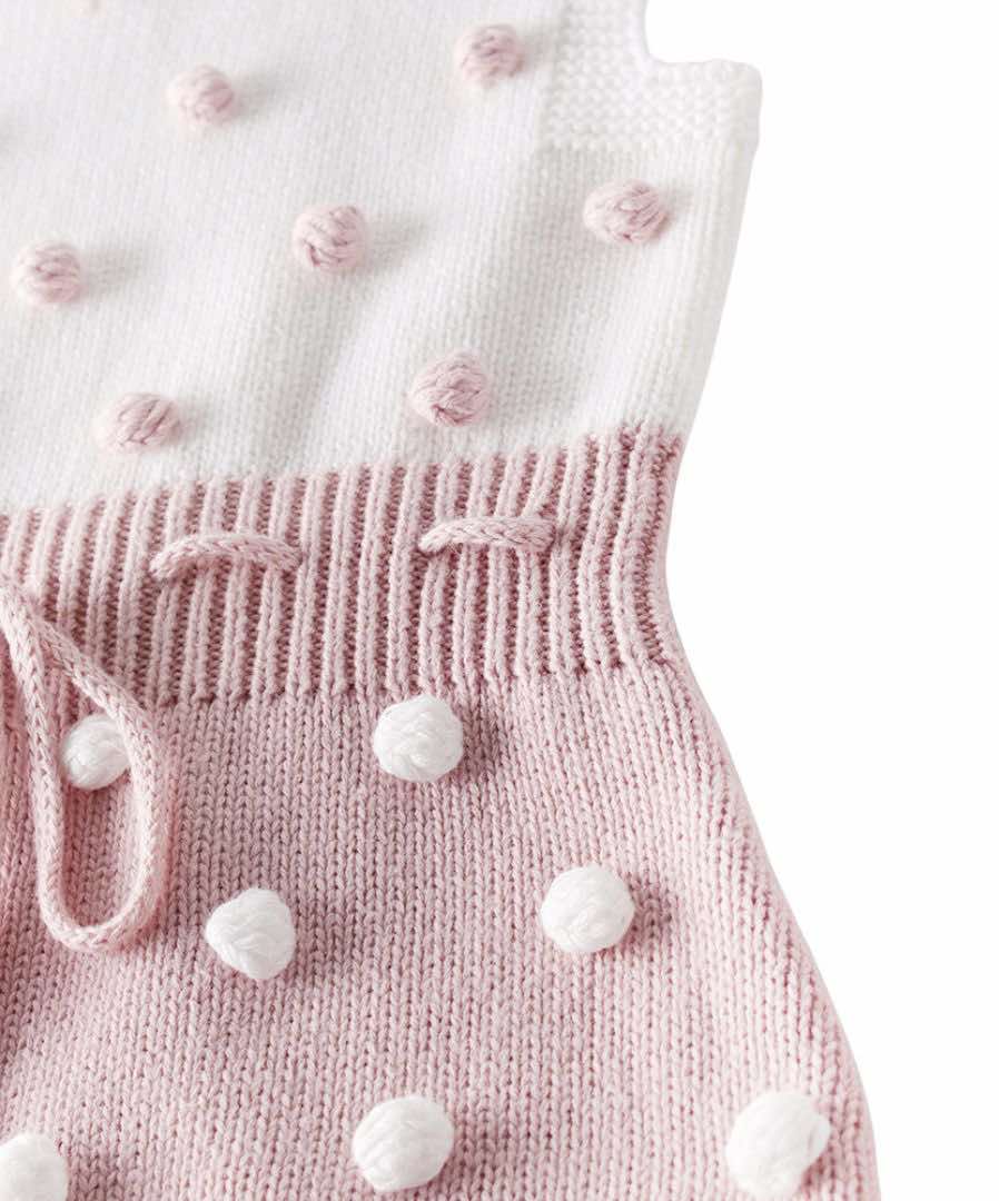 Sleeveless baby girl romper with square neckline and covered buttons