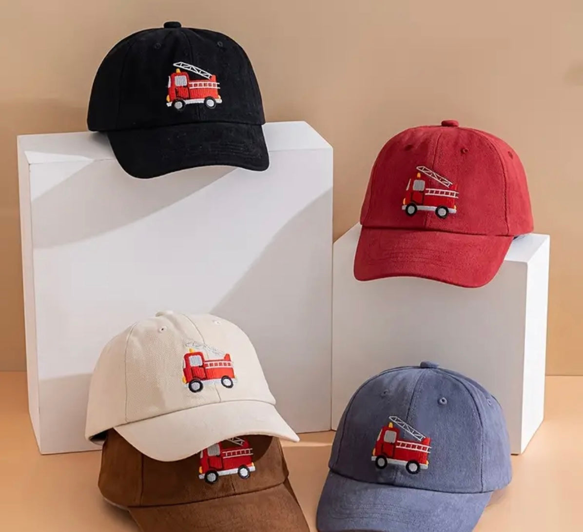 Action shot of the kids' firetruck hat being worn, perfect for imaginative play and outdoor adventures.