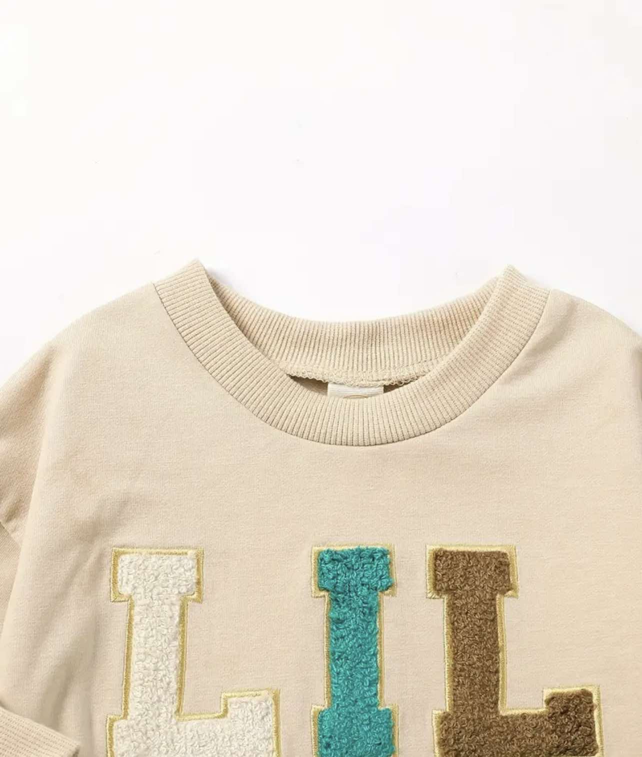 Baby boy crew neck romper with bold ‘Lil Bro’ print – ideal for family photos and everyday wear