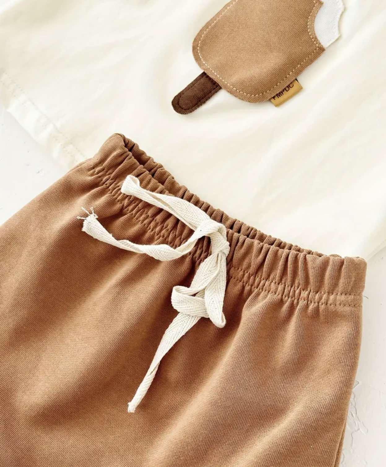 Baby summer clothes for boys, featuring a playful ice cream design, ideal for outdoor fun