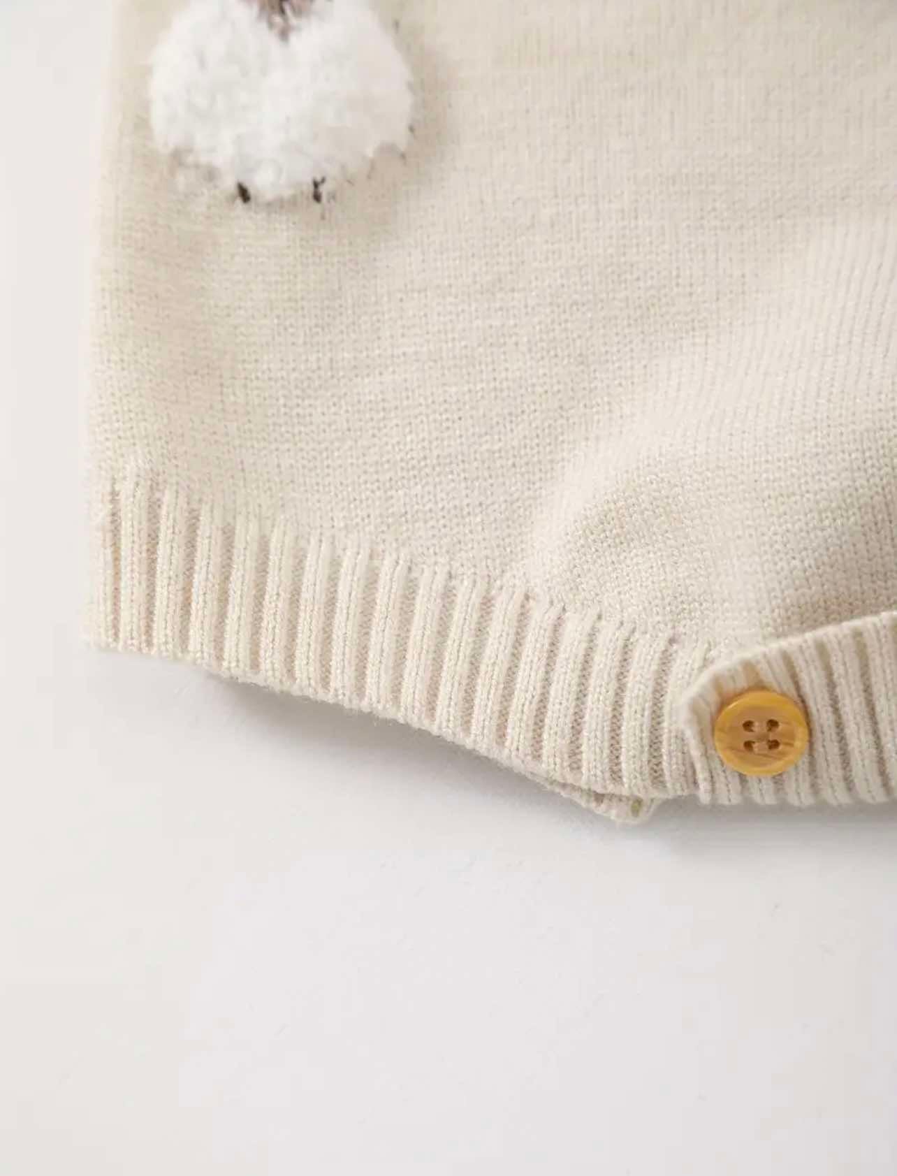 Beige baby romper with soft knit texture and cute lamb design, styled for spring and farm vibes