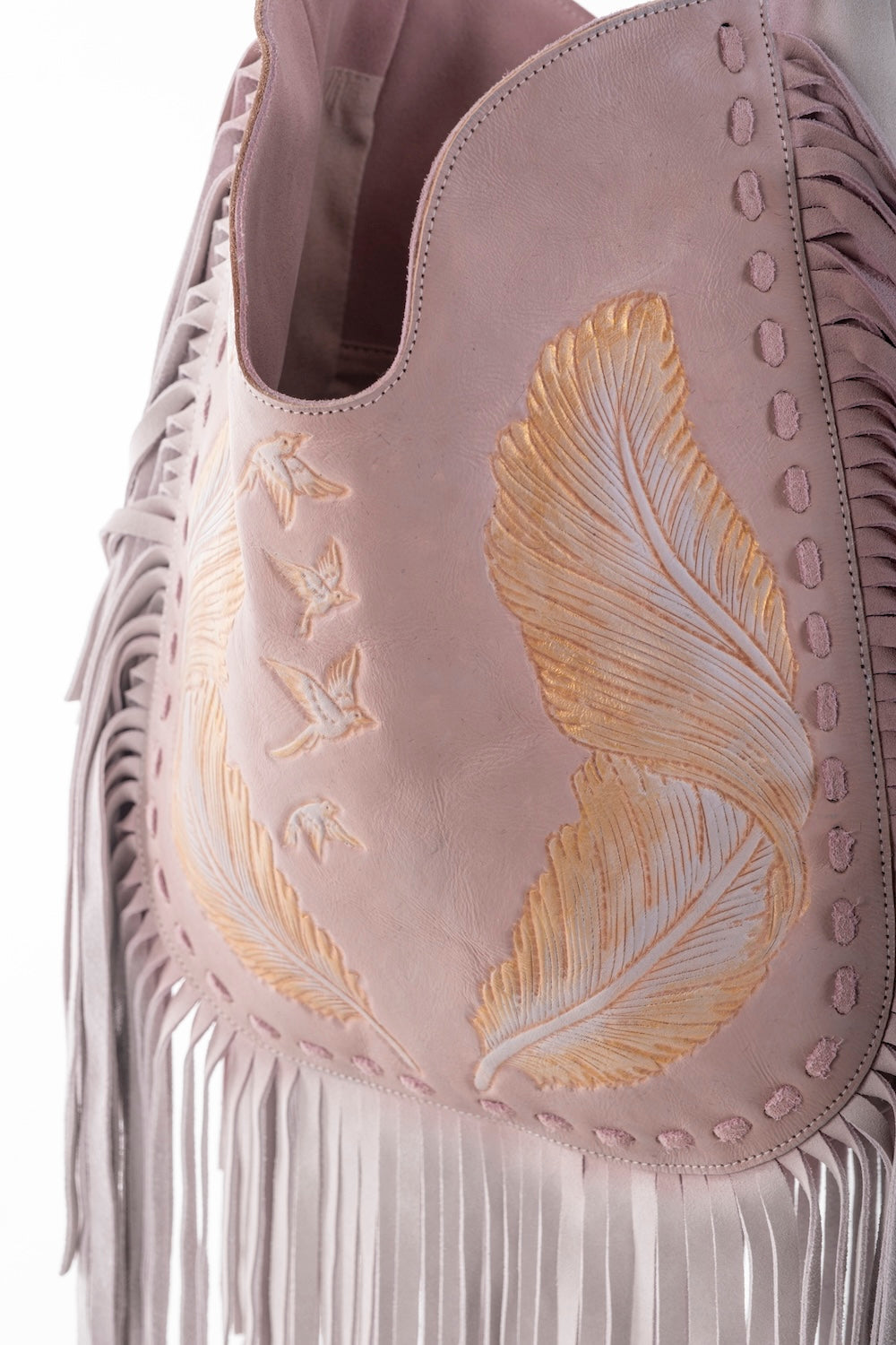 pink suede bag with feather and bird motif