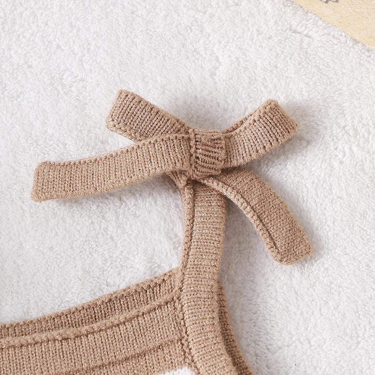 Chocolate Striped Frilly Knit Romper Size Chart: The romper displayed with a size chart indicating measurements for 0-18 months.