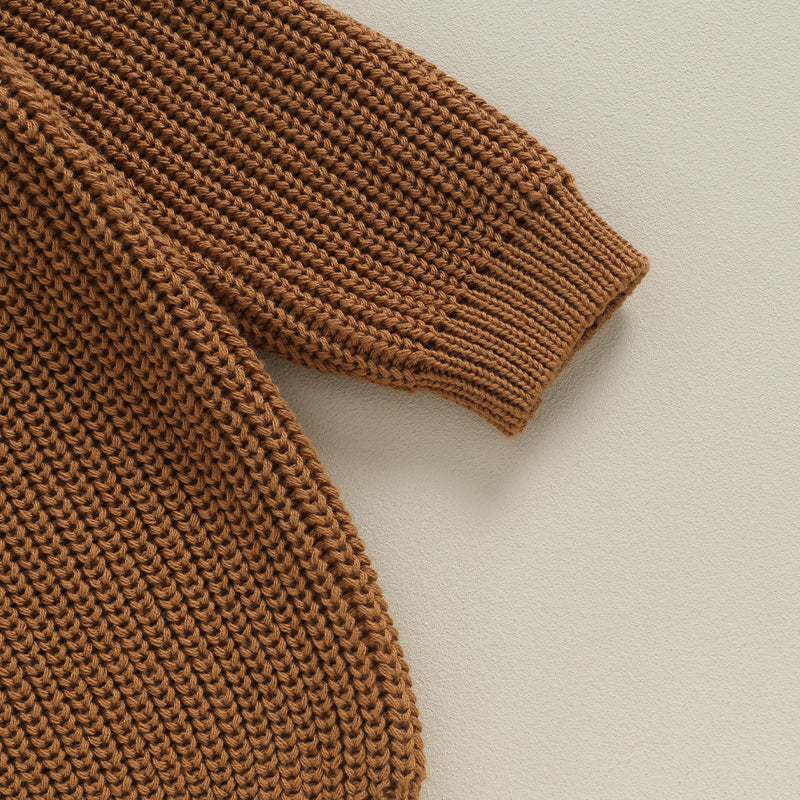 Close-up of sleeve on brown “Big Bro” jumper for toddlers; soft ribbed cuff and long sleeve design made from cotton-polyester blend; premium big brother jumper Australia with durable stitching and comfy fit for everyday play and special sibling moments.