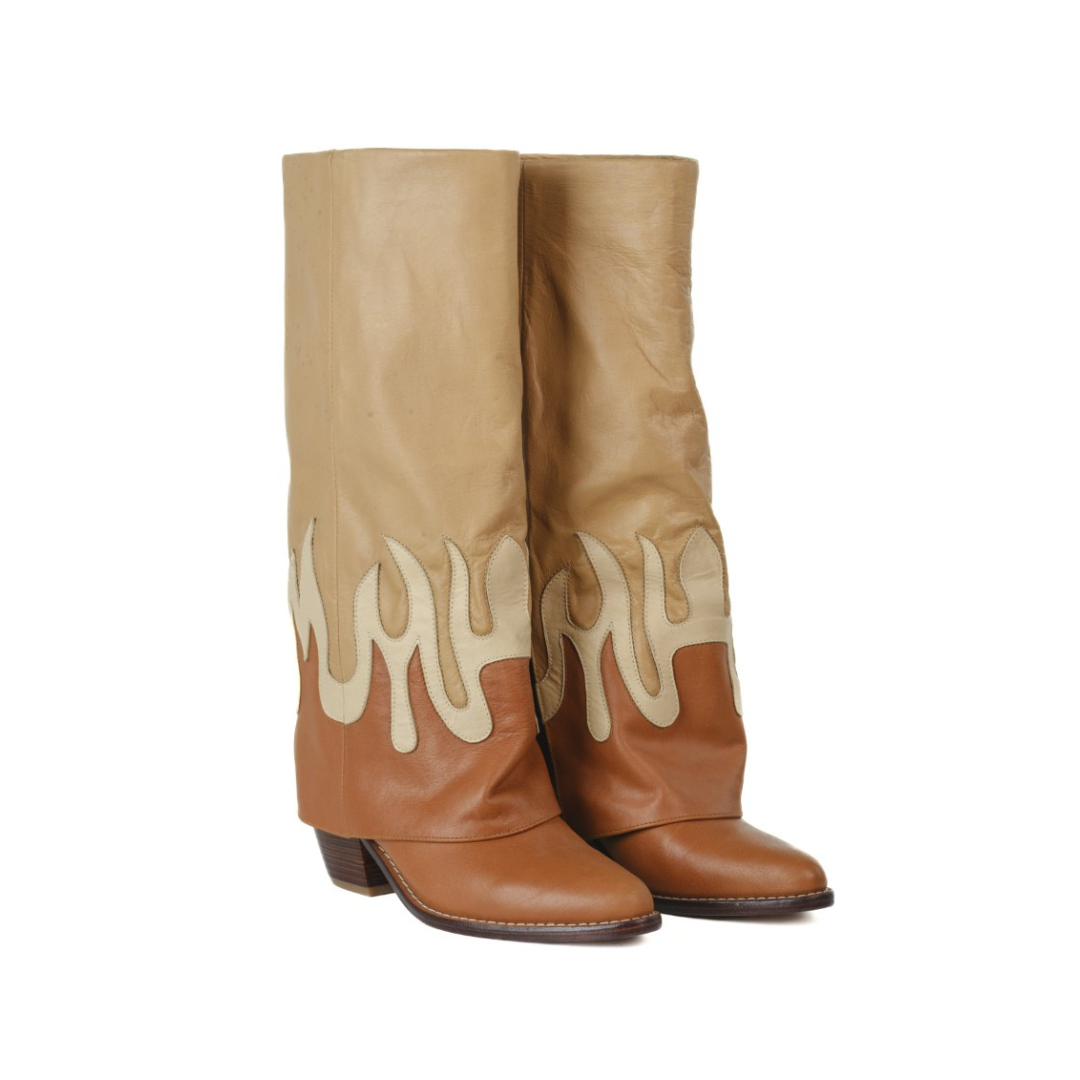 A pair of mid-calf western boots in tan and brown leather, featuring a cream-colored flame-like pattern on the shafts and low stacked heels, shown against a plain white background.