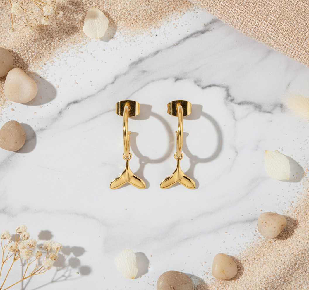 House of Hide Perth Australia Golden Drift Whale Tail Hoops stylish marine-inspired gold earrings with smooth finish