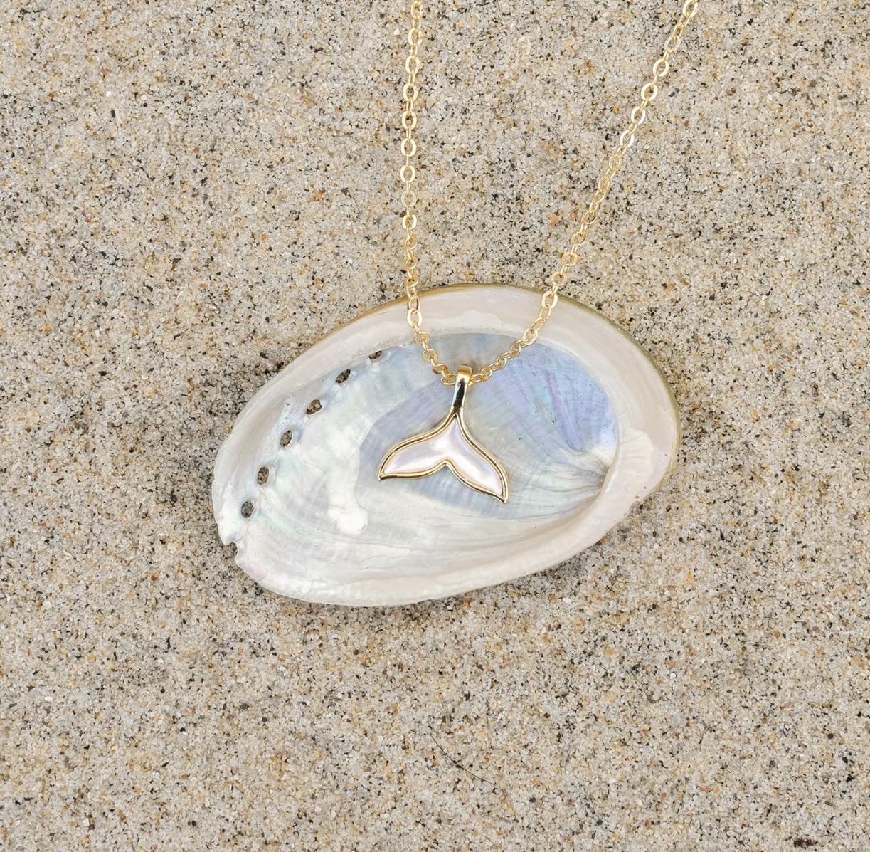 Handcrafted Australian whale tail necklace - a symbol of freedom and strength