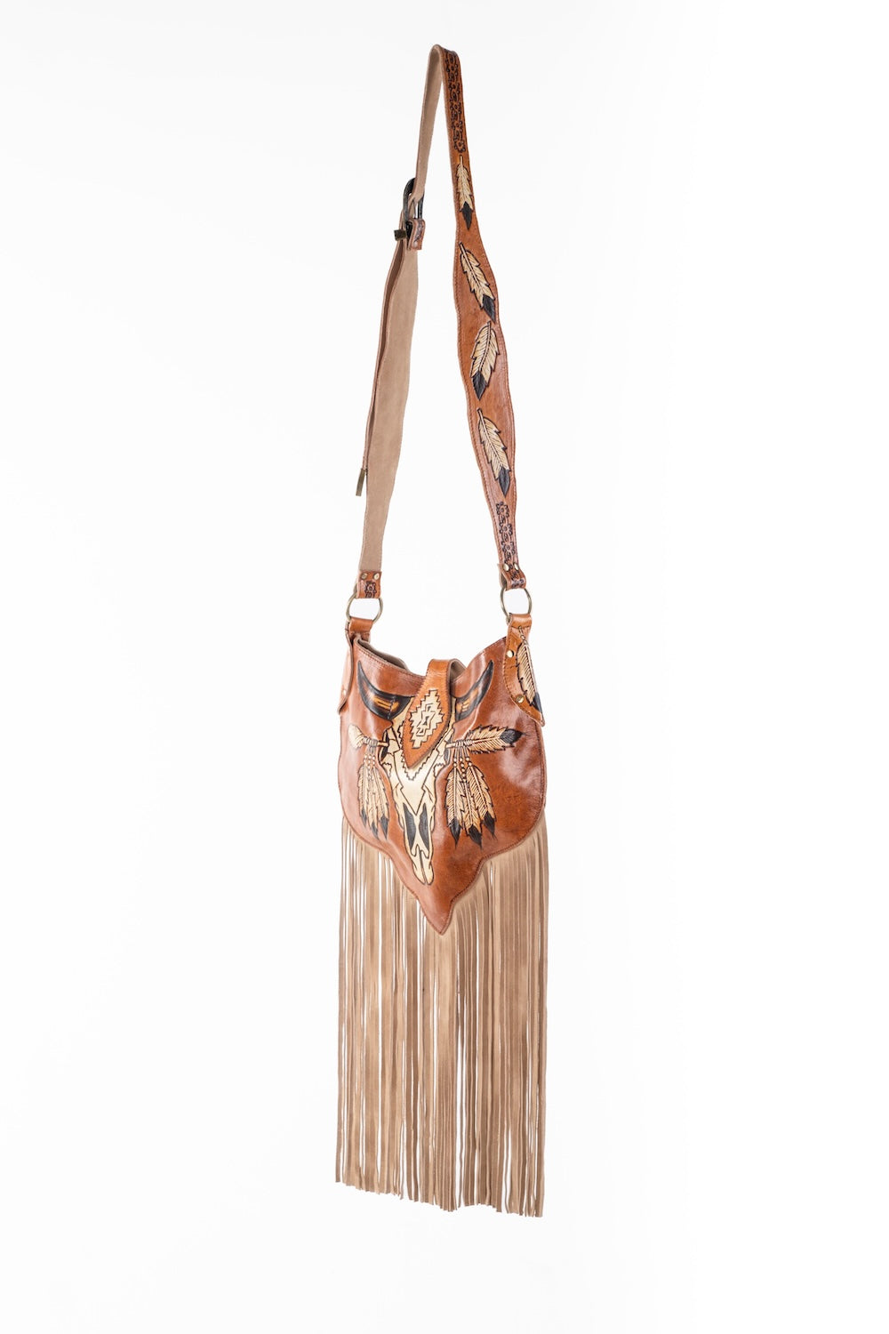 Handcrafted boho fringe bag in warm tan leather, featuring zip closure, internal pockets, and festival-ready design.