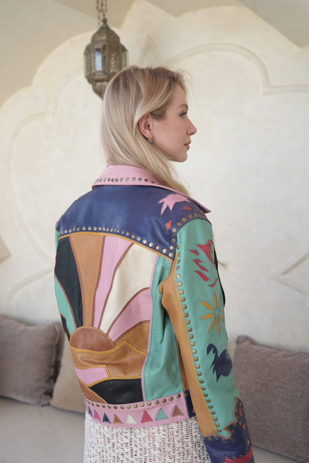 Handmade festival jacket with structured collar and desert-themed panel design