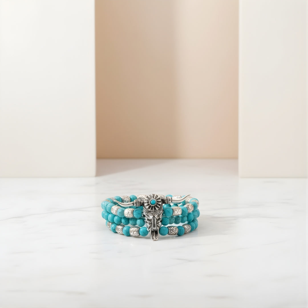 Heart of the Plains Beaded Bracelet Perth House of Hide turquoise bracelet with silver charms on gray background