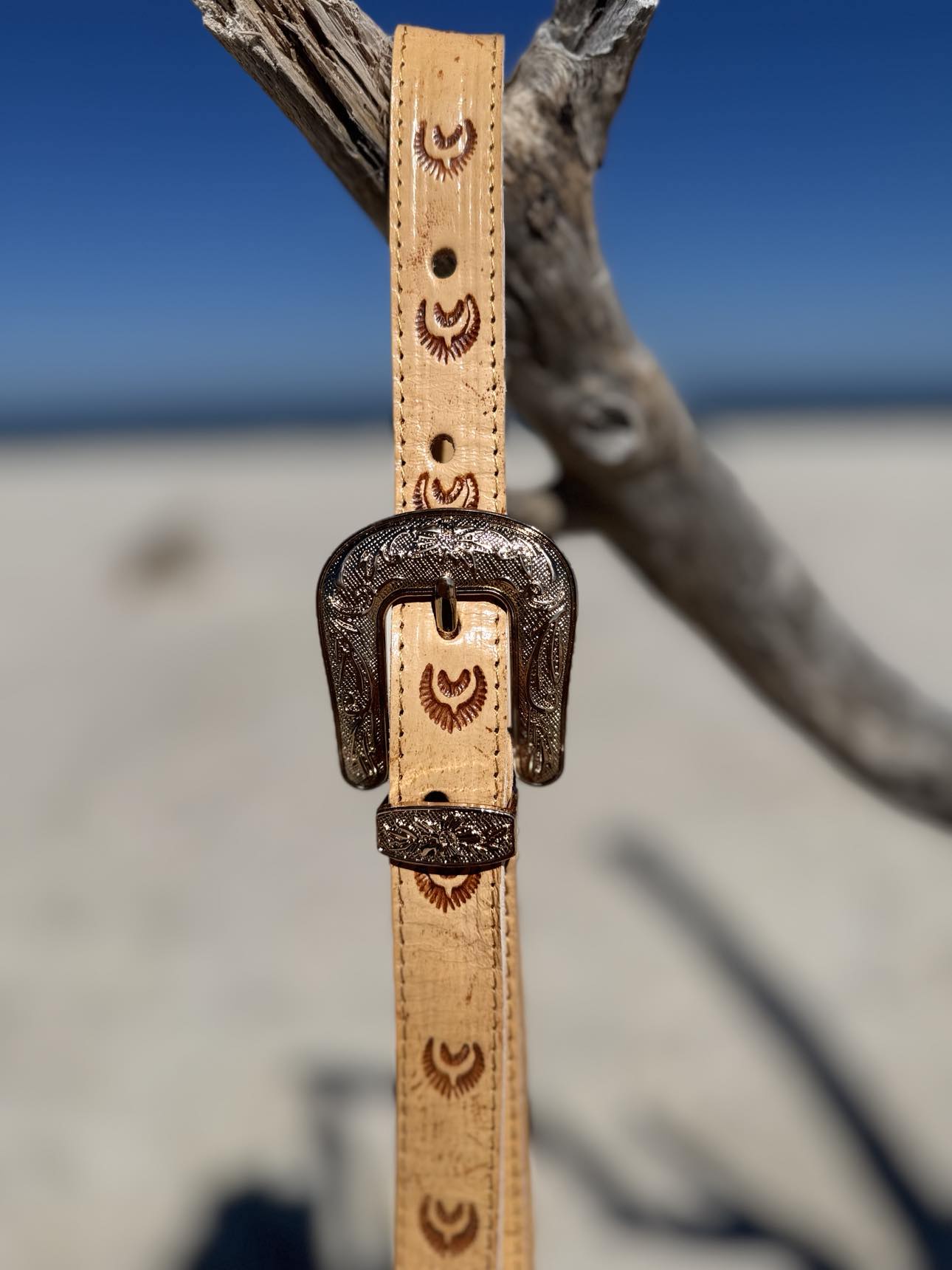 Interior of Savannah Western Fringe Bag featuring zippered pocket and open pockets for organization.