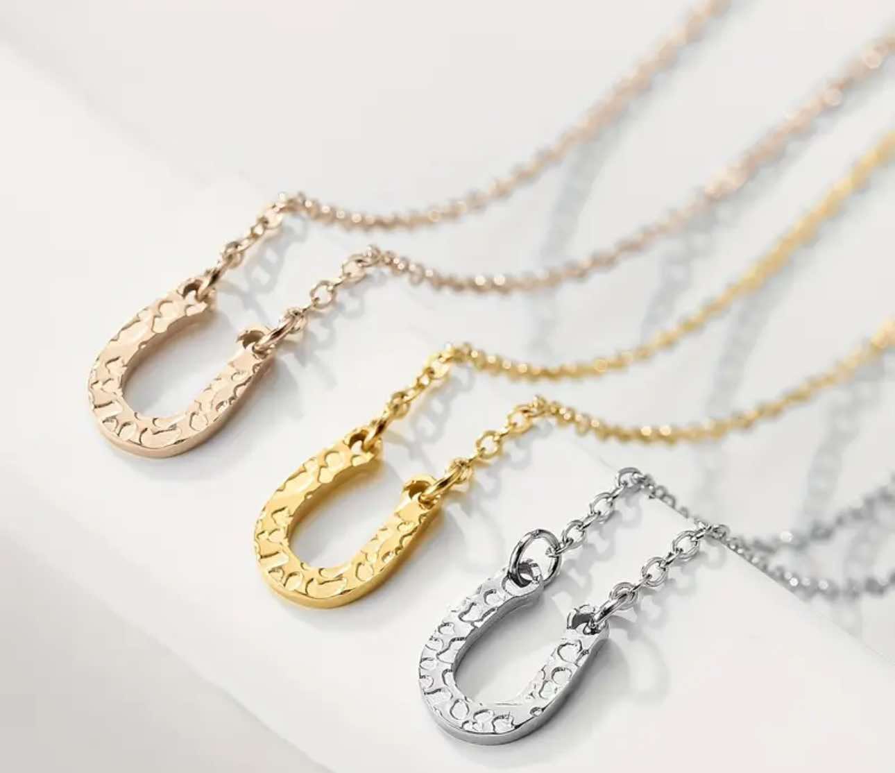 Lucky Horseshoe Necklace in Gold or Silver – A Minimalist, Water-Resistant Design Perfect for Everyday Wear. Available Online.