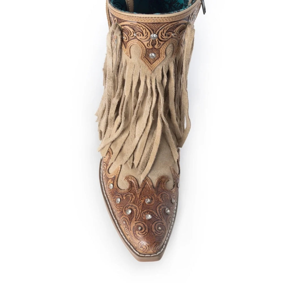 Beige fringe boot with detailed leatherwork on a white background