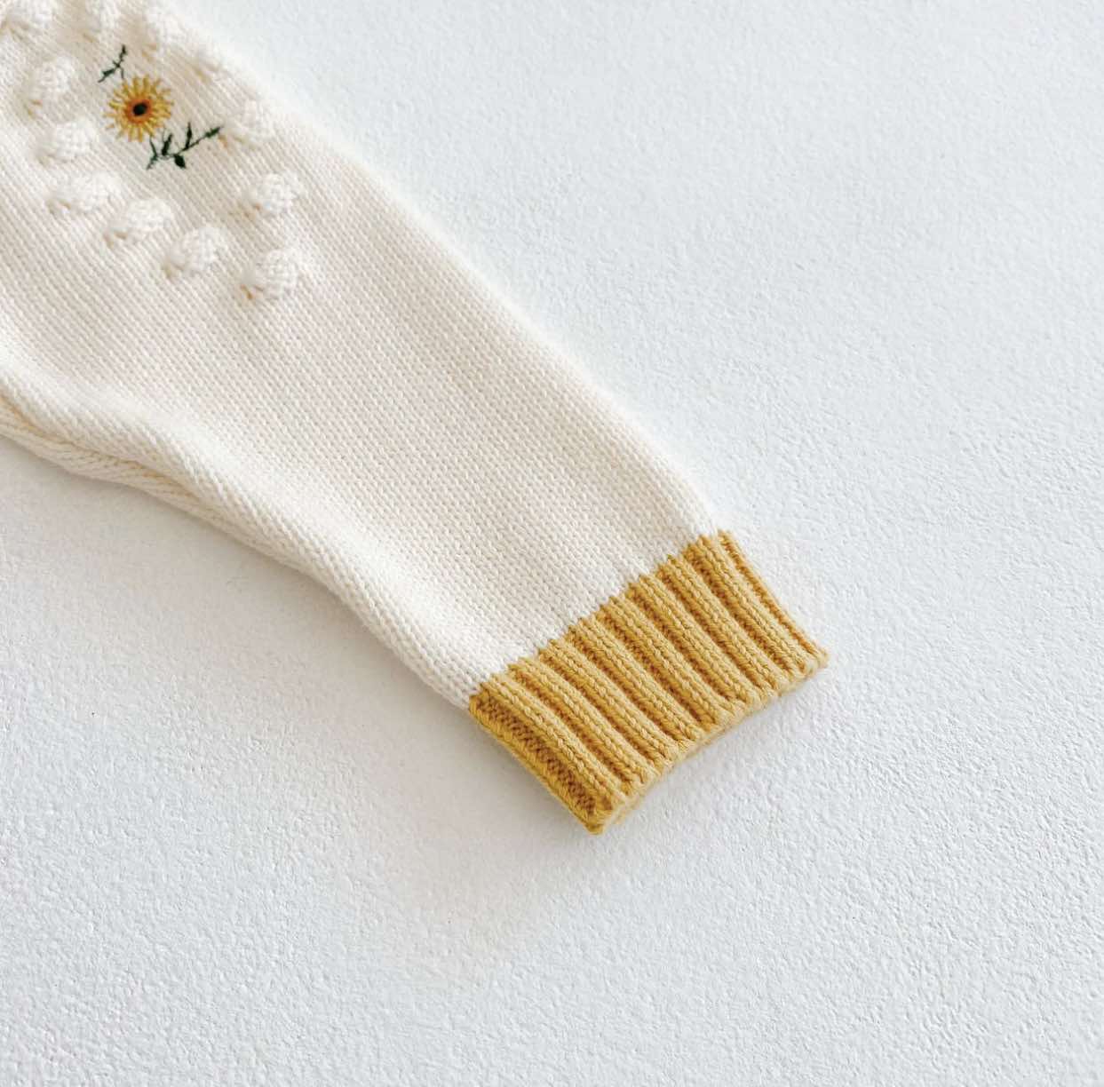 Soft and cosy sunflower knit baby romper for fall and winter