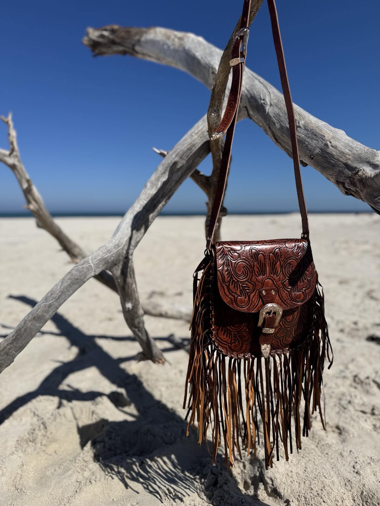House of Hide Handcrafted Leather Bag: The Feyre fringe crossbody, emphasizing the quality and artisanal nature of the design.