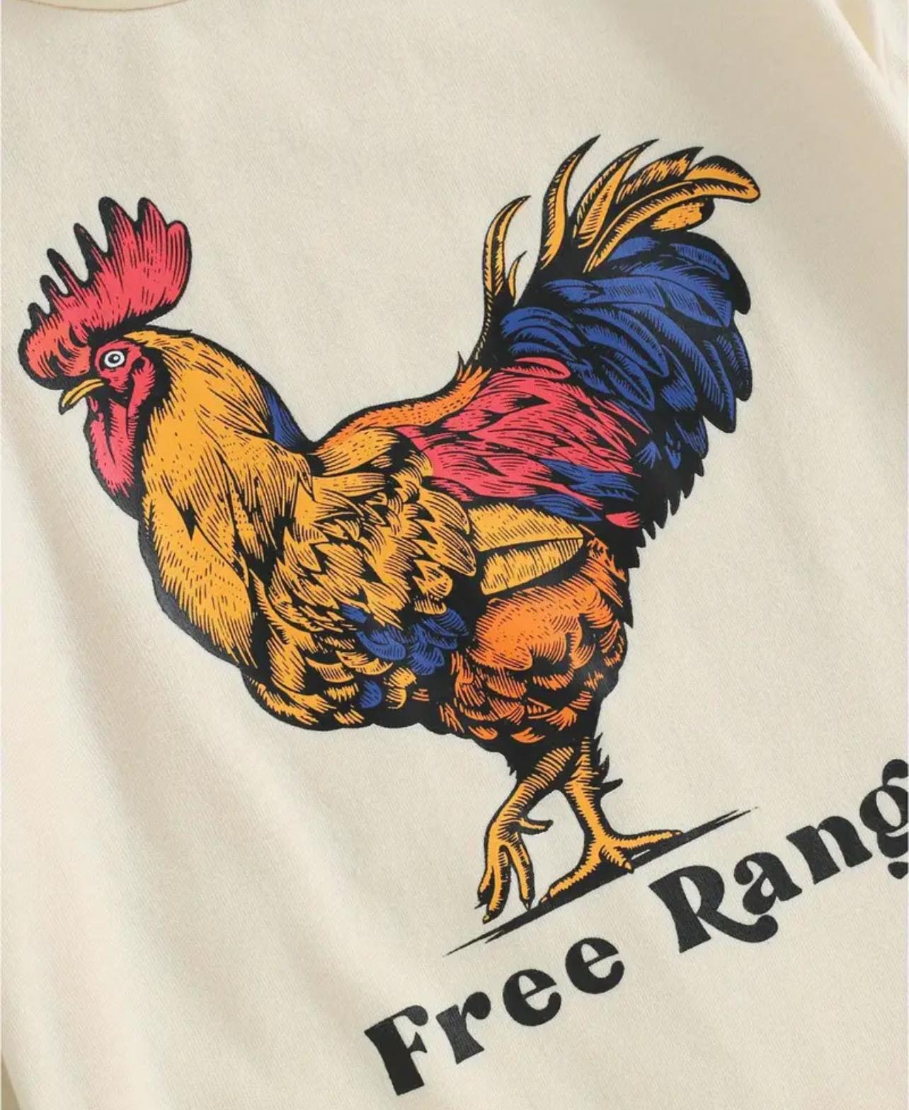Soft cotton farm-themed baby romper with Free Range text