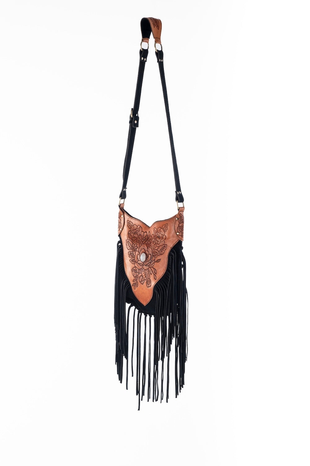 Elegant black fringe bag with artisan floral tooling, crossbody or shoulder wear, and everyday boho-chic style.