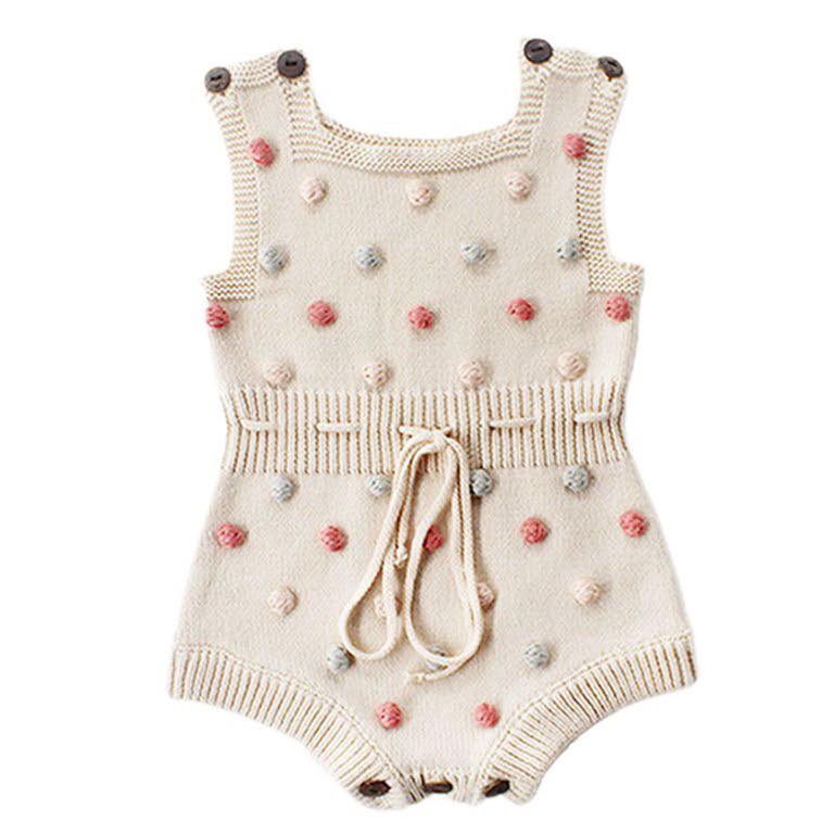 cotton baby romper with pompom and lace-up detail