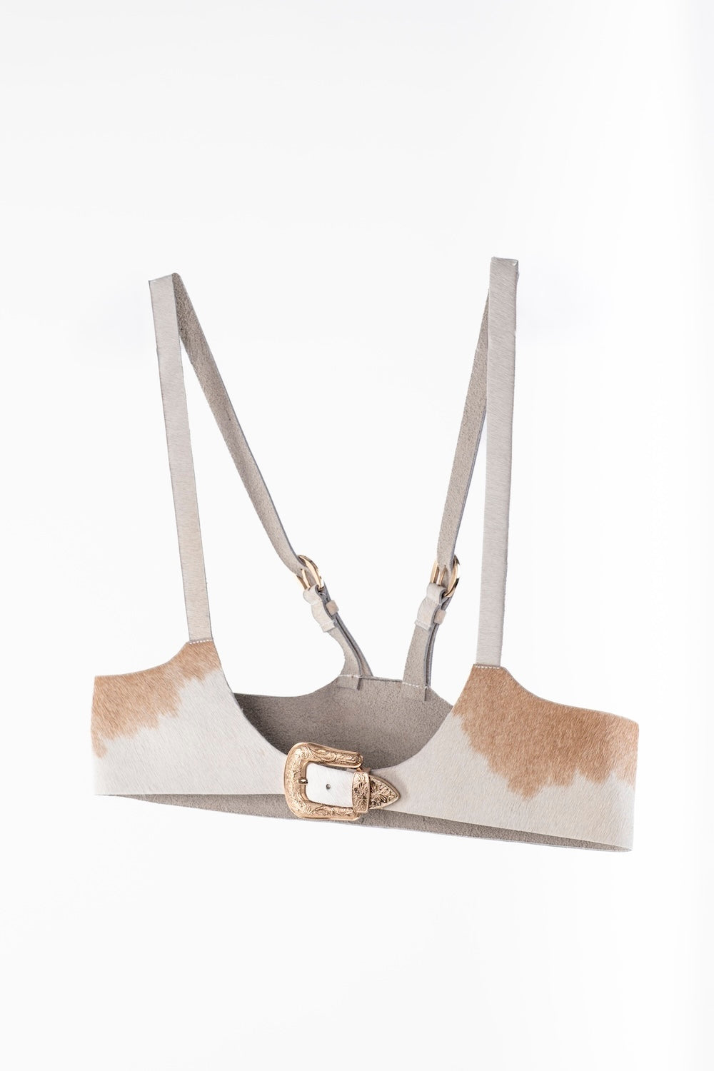 Handcrafted cowhide leather harness with Western buckle detailing.