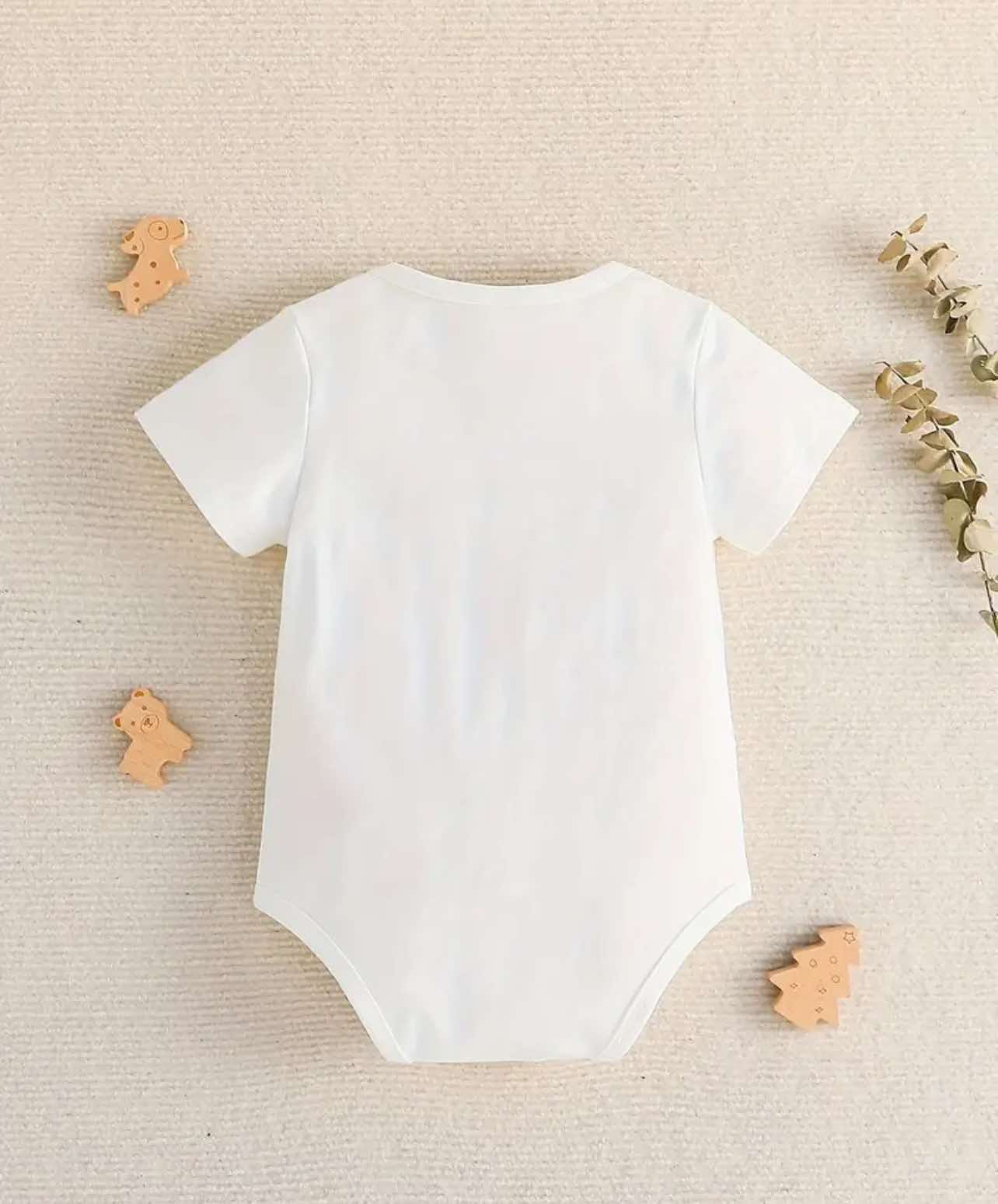 Close-up of soft and breathable cotton fabric on the "Actually This Is My First Rodeo" baby onesie.