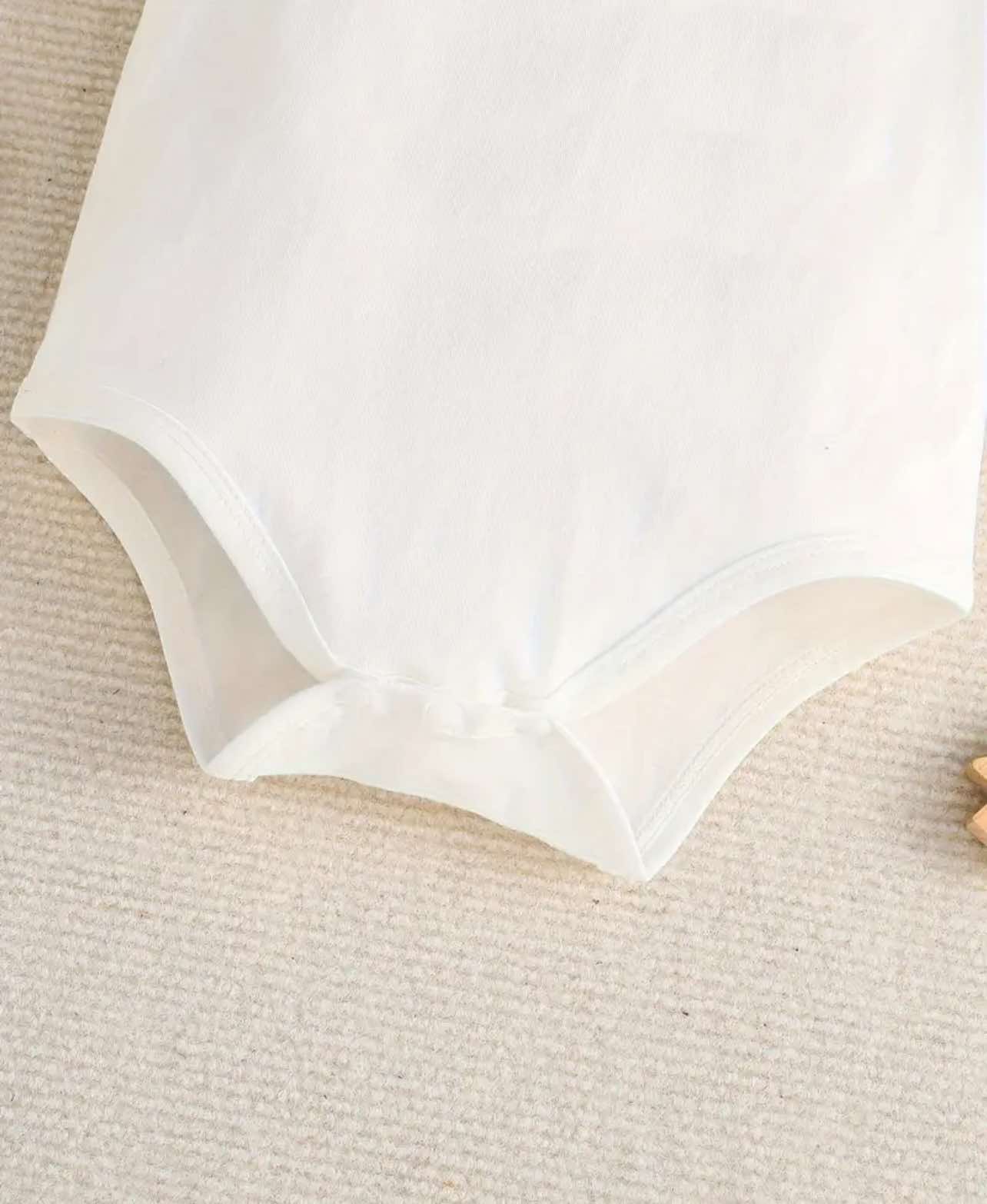 Cute Western-themed baby romper with a fun rodeo-inspired slogan for newborns and infants.