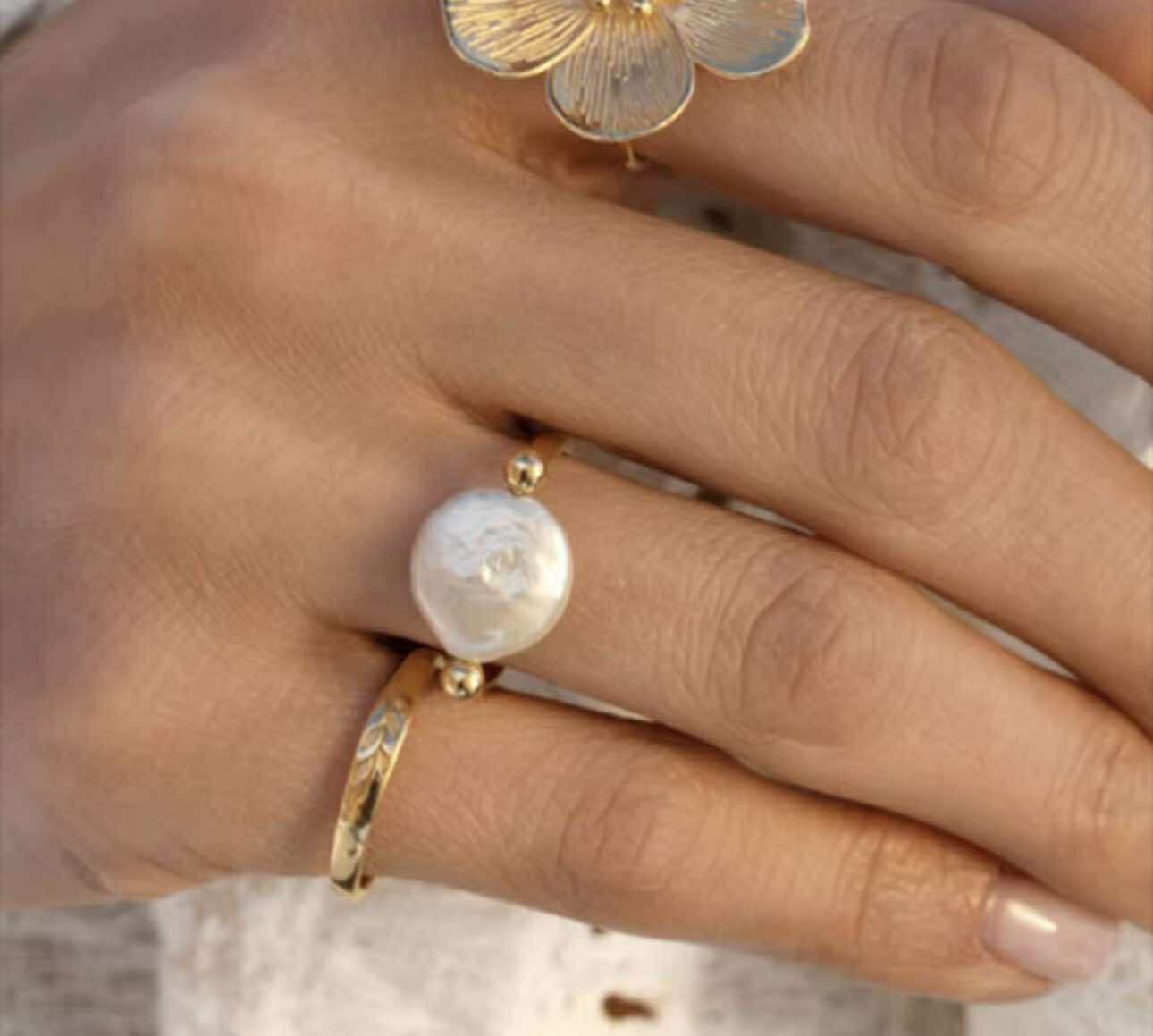 Adjustable 18K gold pearl ring styled with boho outfit for women’s everyday country fashion.