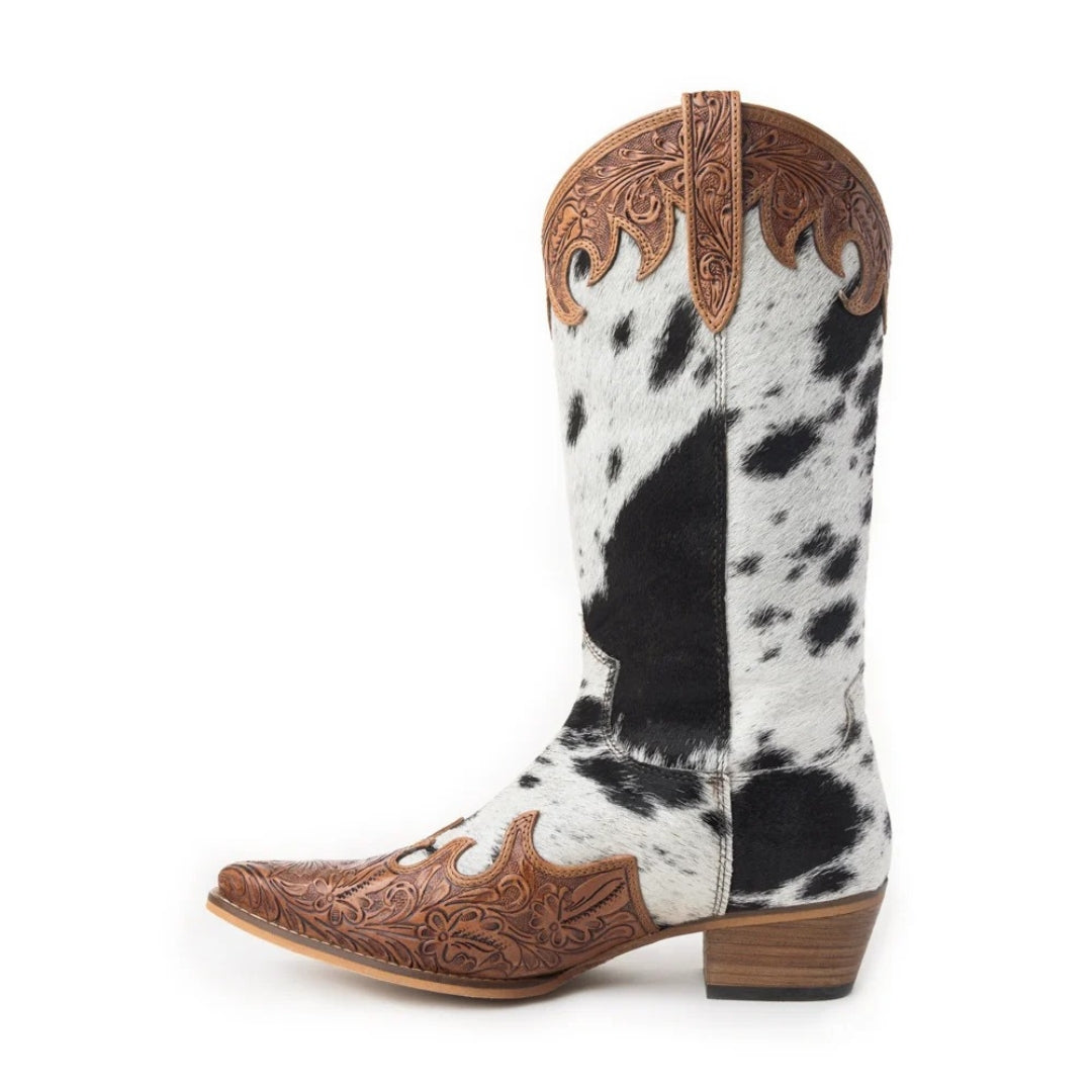 Side view of an Adelaide cowhide boot with honey-toned floral tooling, a snip toe and tapered heel.