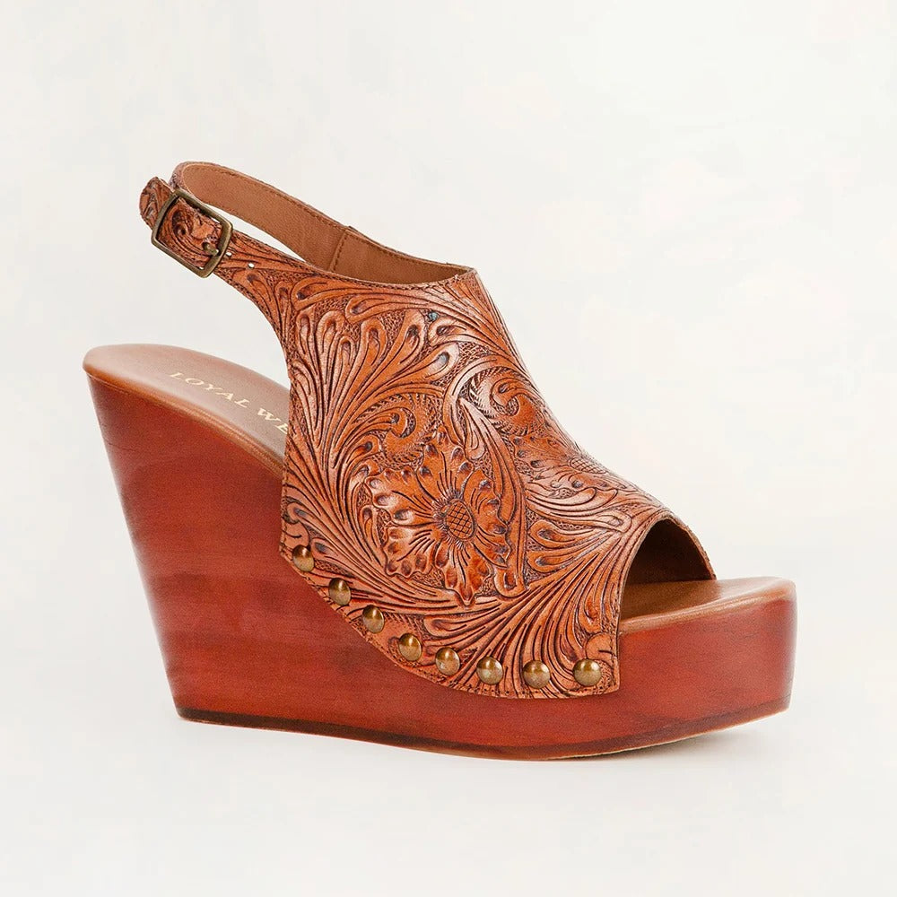 Amelia Sandals from House of Hide in brown leather with intricate tooled design being displayed on white background