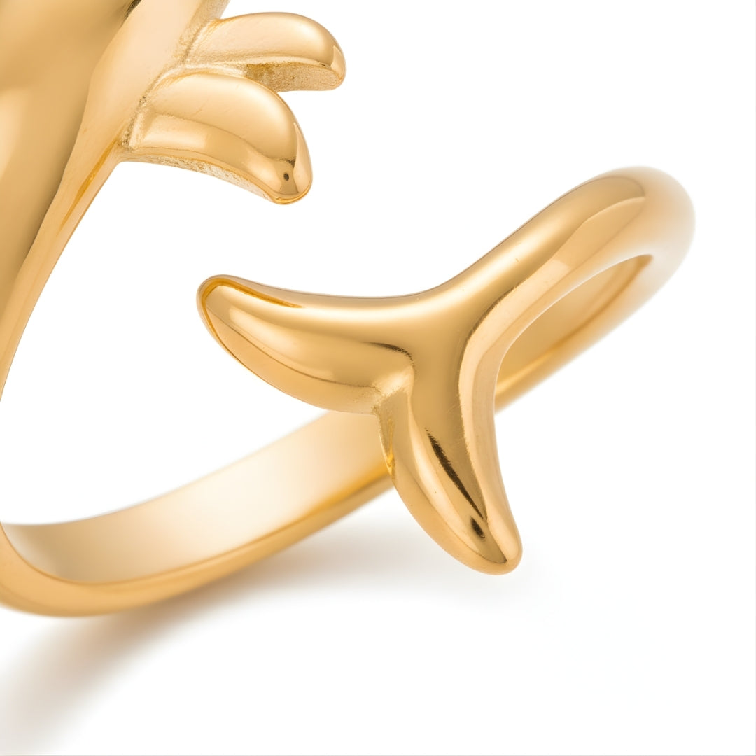AquaSpirit Dolphin Ring in gold finish symbolizing freedom and serenity, photographed in natural light.