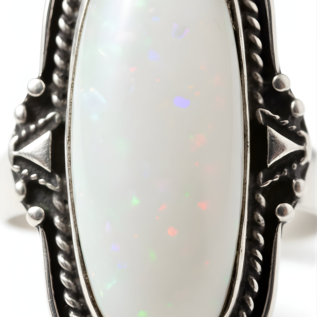 Aurora Reef Opal Ring featuring luminous central stone on marble backdrop Perth jewellery