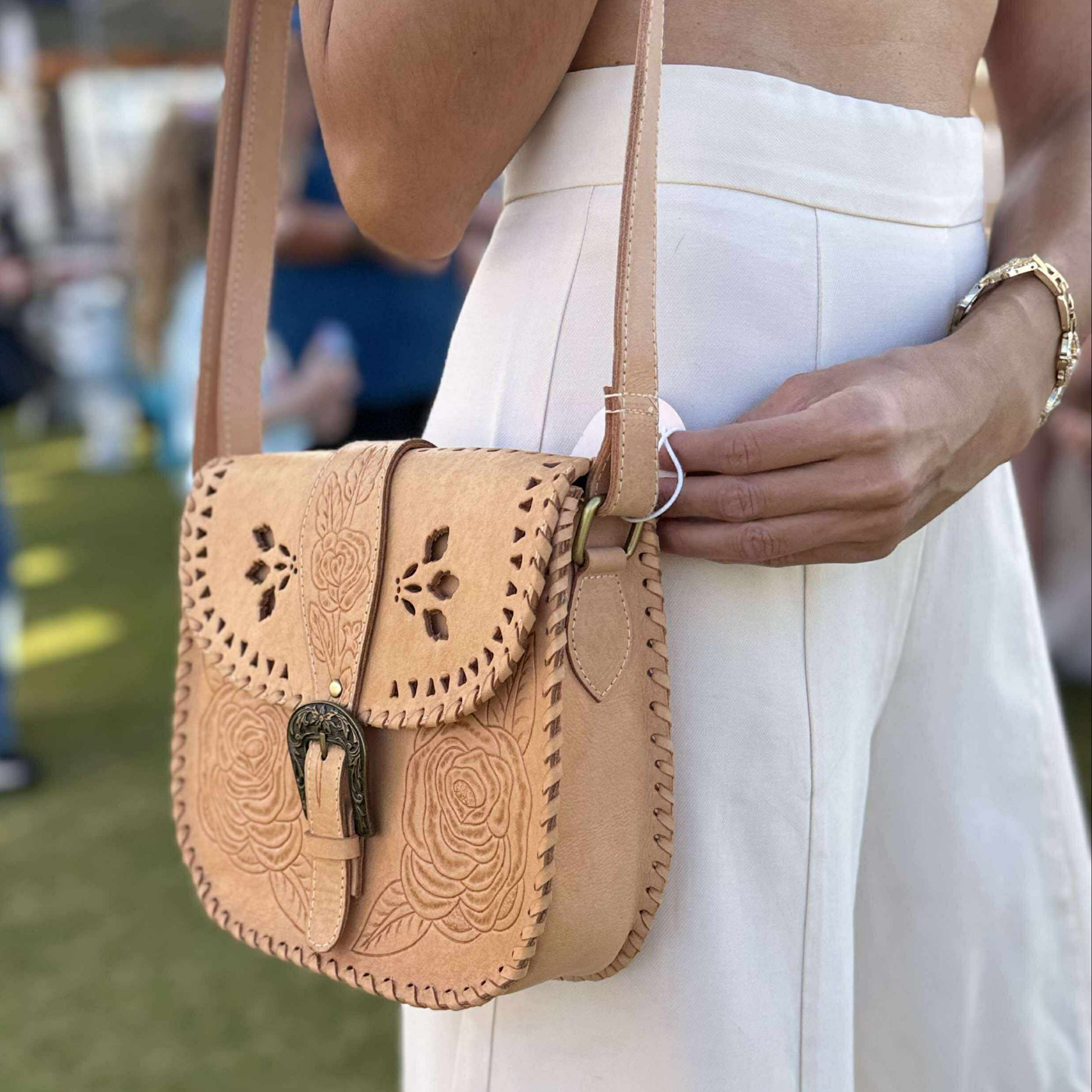 Hand-tooled leather shoulder bag with floral design, "Desert Rose," vintage-inspired, boho-style bag.