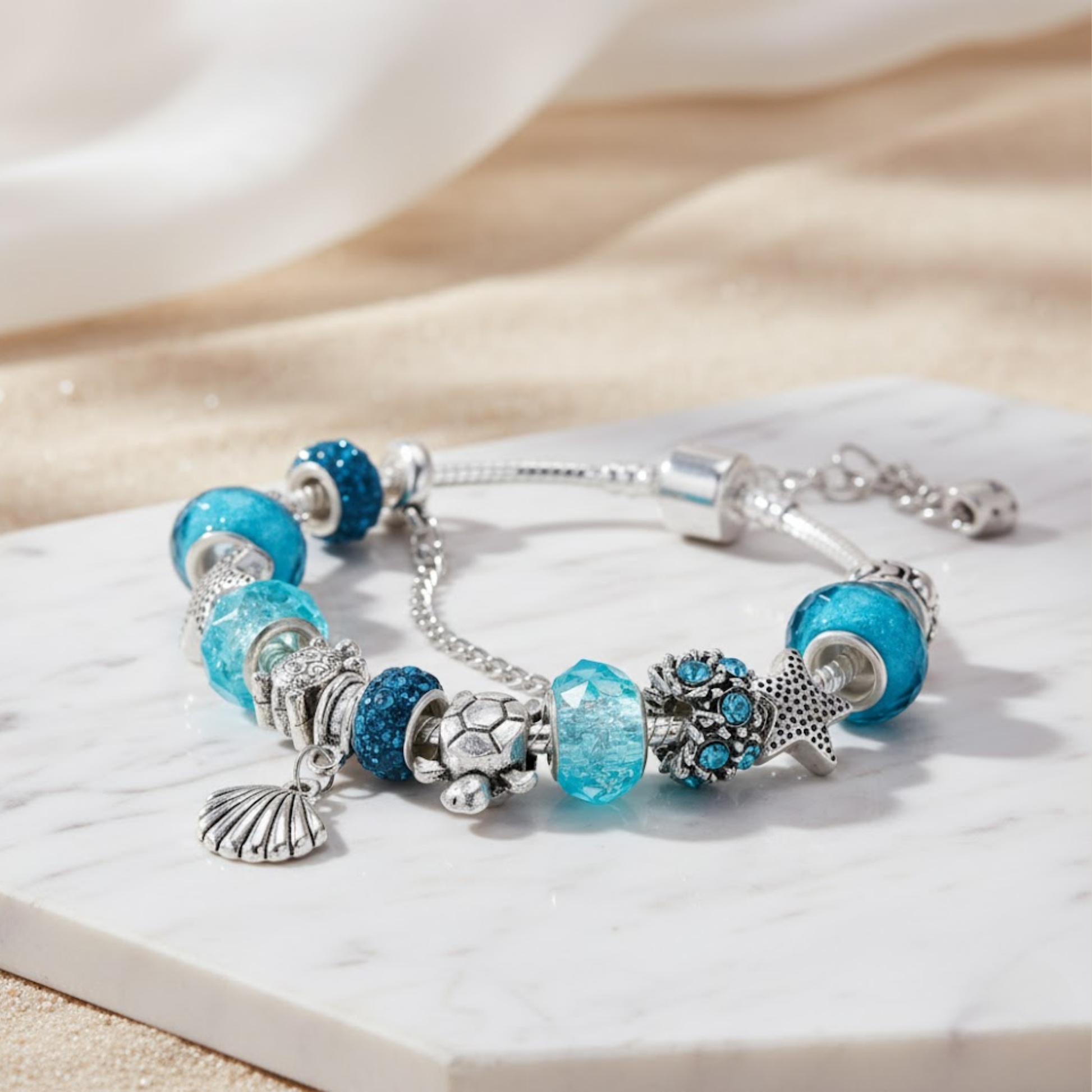 House of Hide Azure Tide Bracelet with turtle, starfish and seashell charms inspired by Australian coast