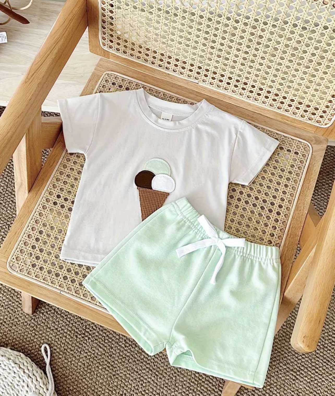 Baby enjoying a picnic in Australia, dressed in the stylish Ice Cream Set Mint Green.