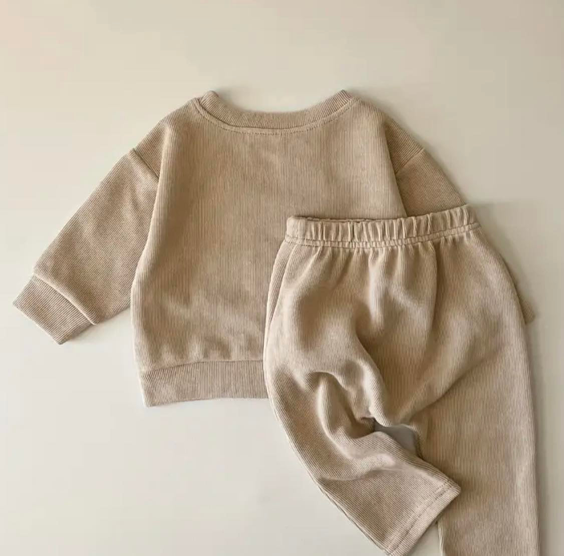 Back of Unisex baby "Hey Cutie" printed sweatshirt and pants set.