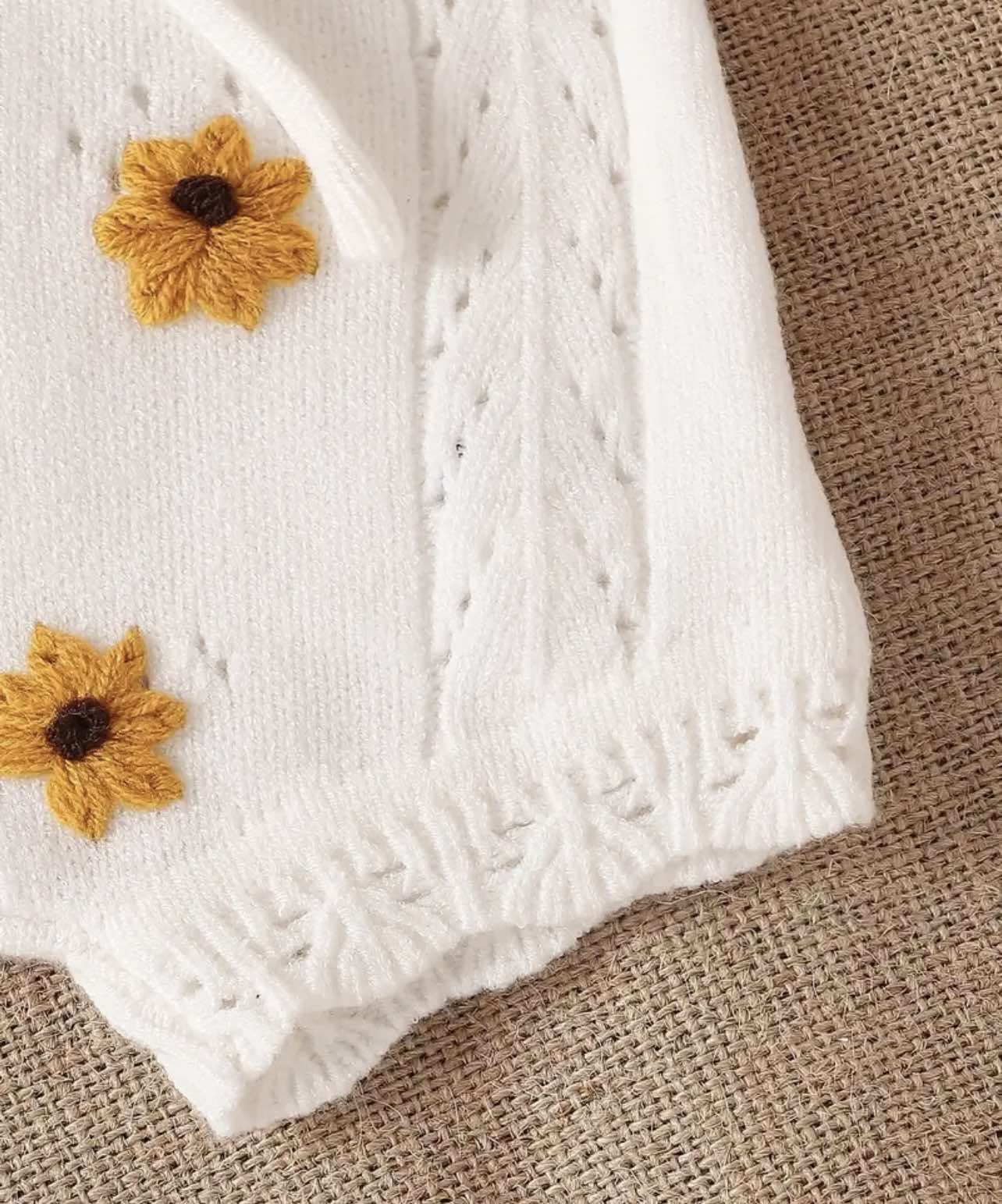 Back view of the White Sunflower Knit Two-Piece Set highlighting the breathable knit material and snug fit.