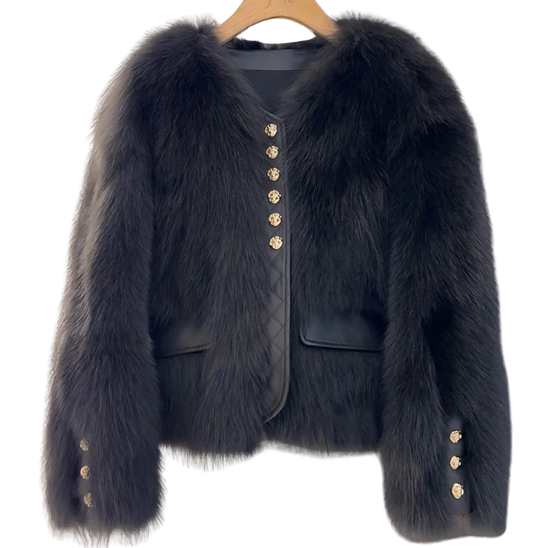 Bailey Jacket from House of Hide in plush black faux fur with gold button closures, vegan leather placket and pocket trim, full voluminous sleeves, cropped boxy silhouette being displayed on clean white background for product photography