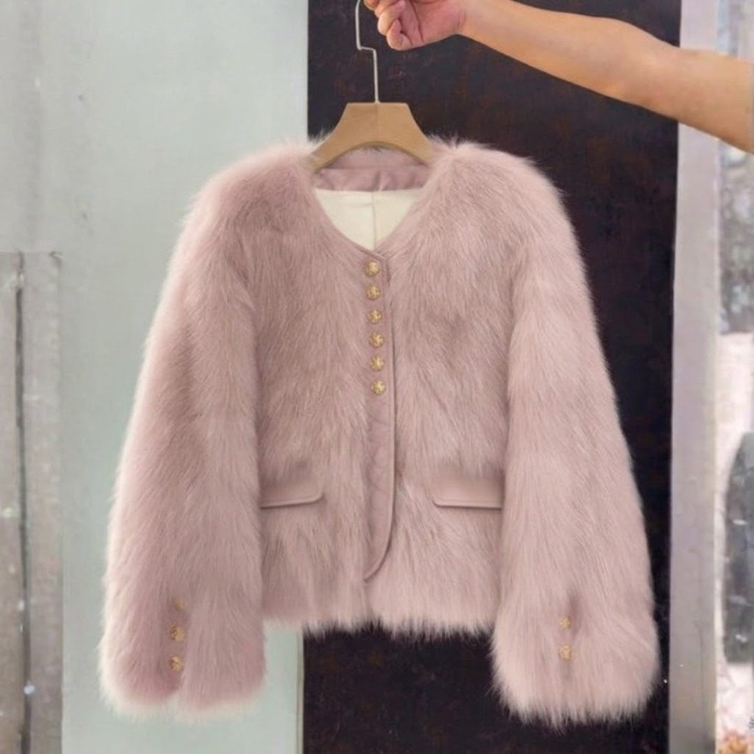 Cropped Faux Fur Jacket from House of Hide in soft blush pink faux fur with smooth vegan leather trim, engraved gold buttons, fitted cropped length with full sleeves, sweet romantic edge statement jacket designed for adding softness to any look