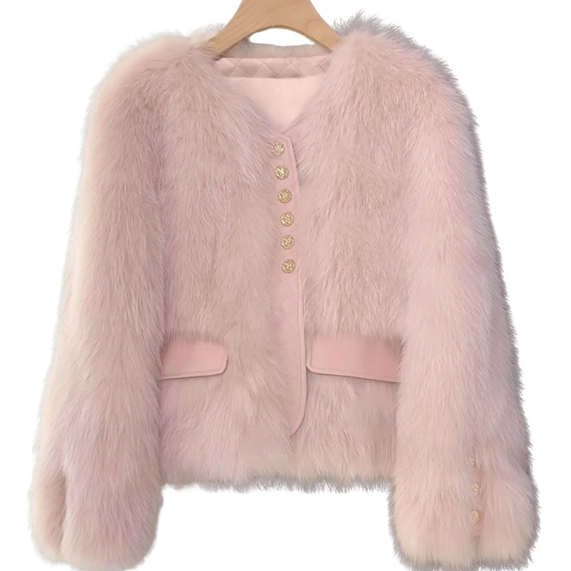 Cropped Faux Fur Jacket from House of Hide in soft blush pink plush faux fur with vegan leather trim and engraved gold button details, voluminous sleeves, fitted cropped length, pocket accents being displayed as romantic statement jacket for effortless styling
