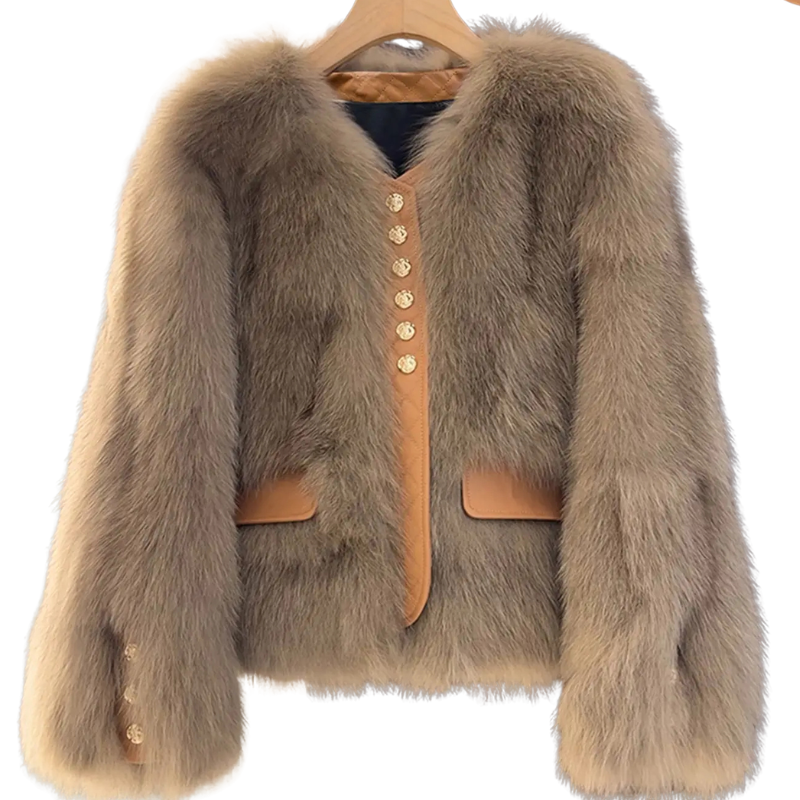 Bailey Jacket from House of Hide in camel-toned plush faux fur featuring vegan leather pocket trim, gold engraved button hardware, voluminous long sleeves, cropped silhouette being displayed as refined western-polish layering piece on styled backdrop