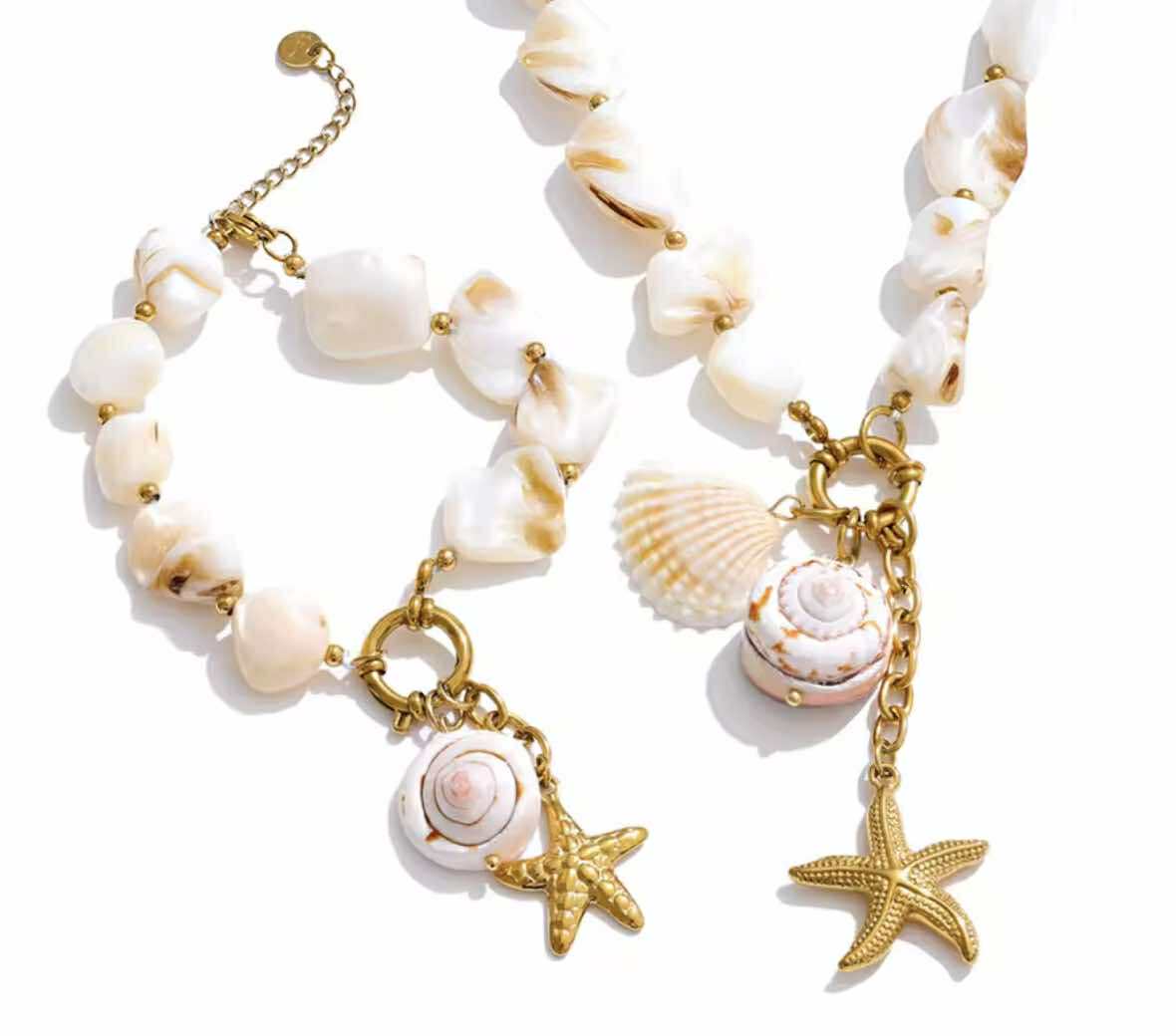Baroque Seashell Charm Bracelet with white shell beads and gold-plated starfish charm