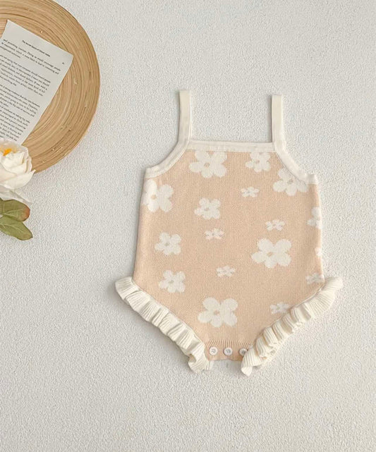 Beige floral knitted romper for summer, soft cotton fabric with detailed flower pattern, ideal for ages 3-6 months.