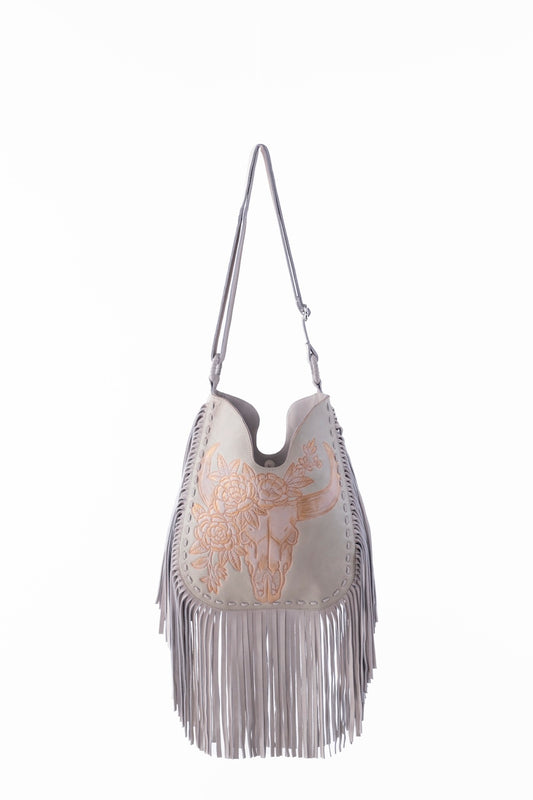 Bindi Bullhead with Flowers leather fringe bag in white, hand-tooled floral bullhead design, boho Western crossbody with stainless steel hardware.