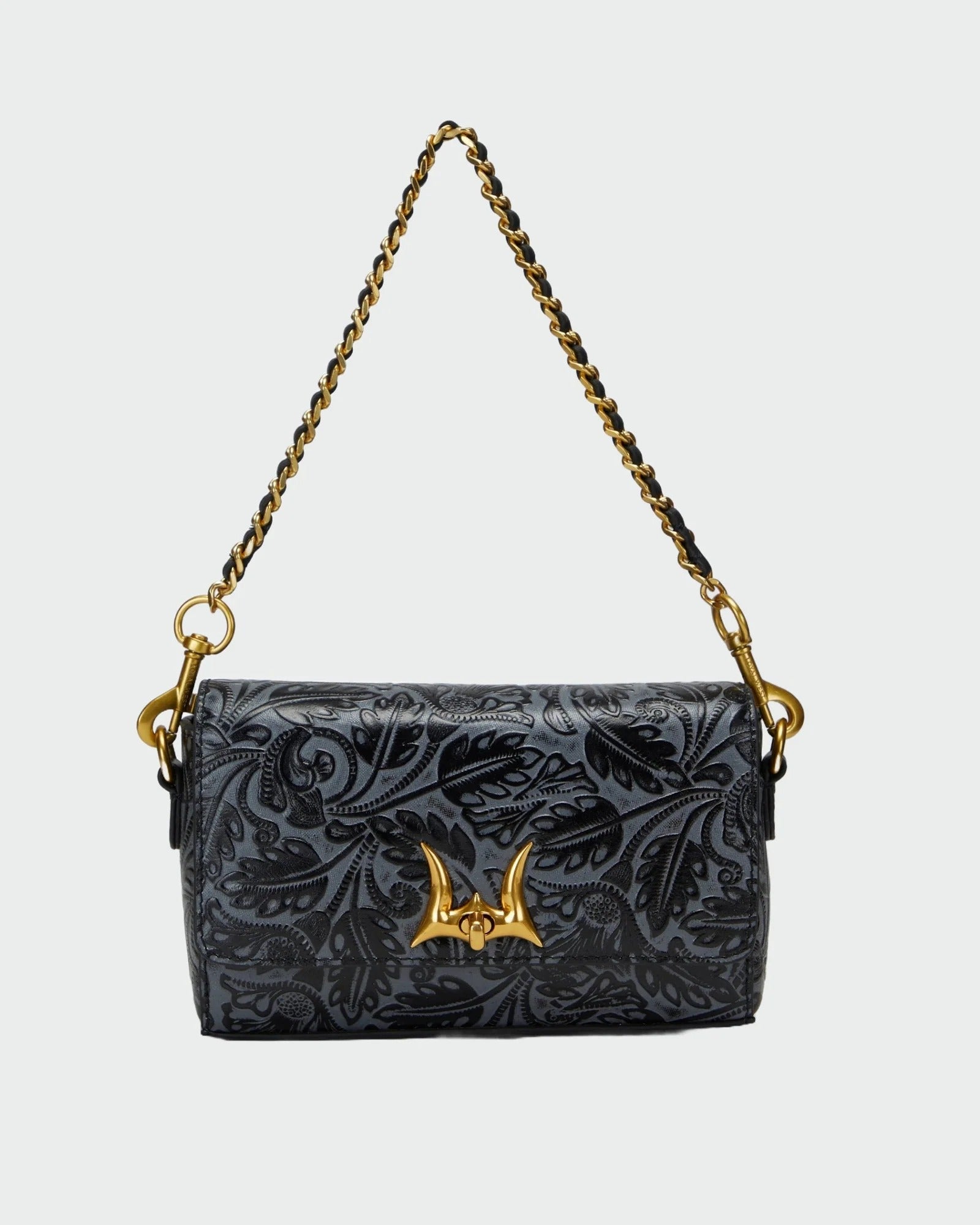 House of Hide genuine leather black floral-patterned handbag featuring a gold-tone chain strap on a light gray studio background