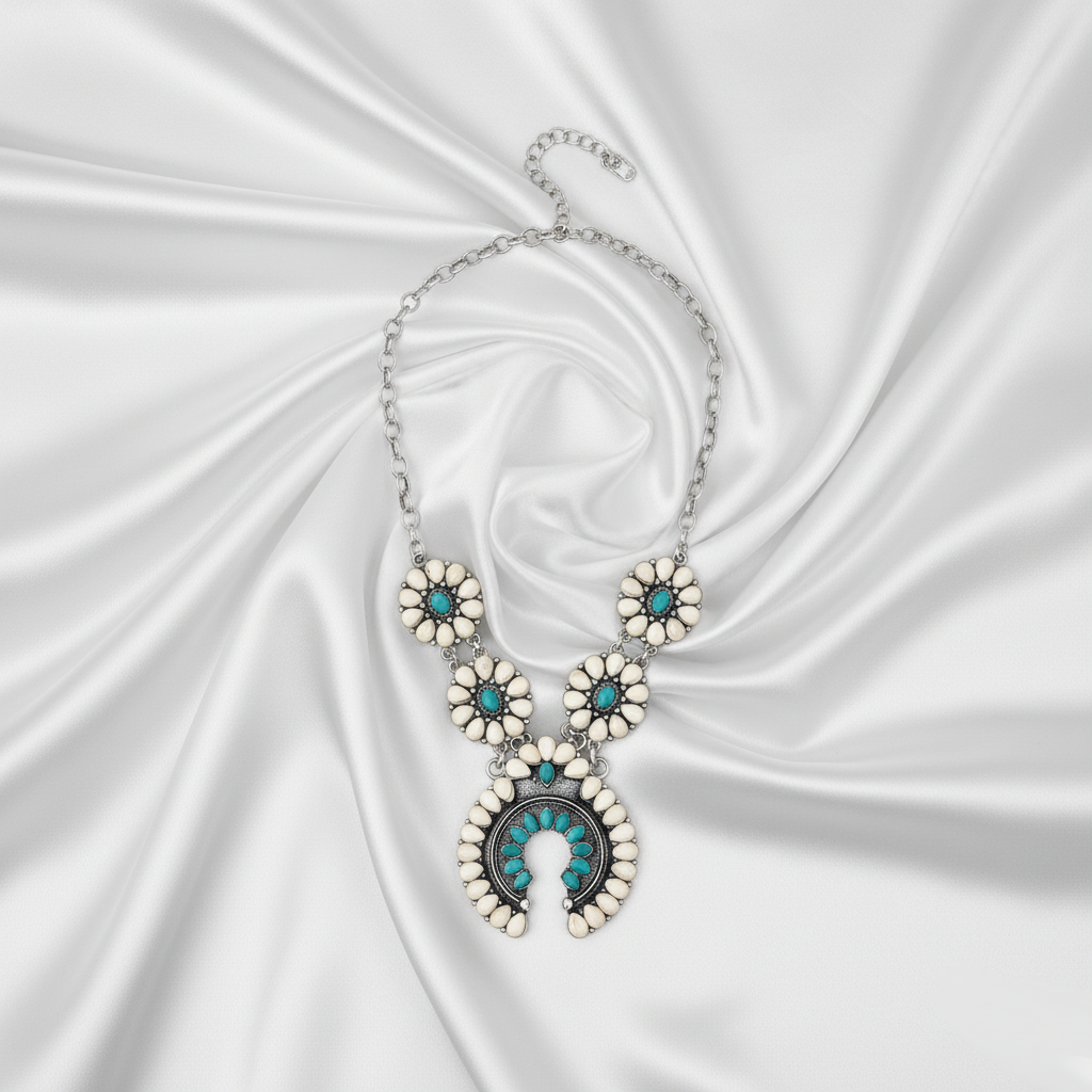 Bohemian Blooming Necklace Perth Australia Houseofhide photographed in soft light showing intricate floral and moon motifs.