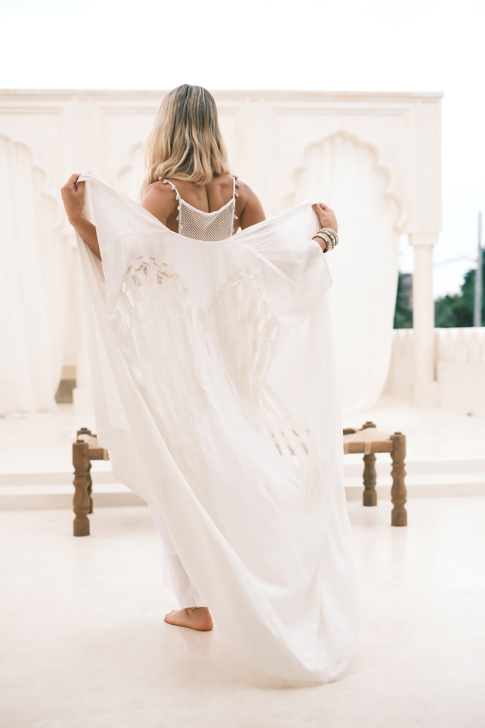 Boho kimono in white with apricot detailing, lightweight flowy fabric perfect for layering