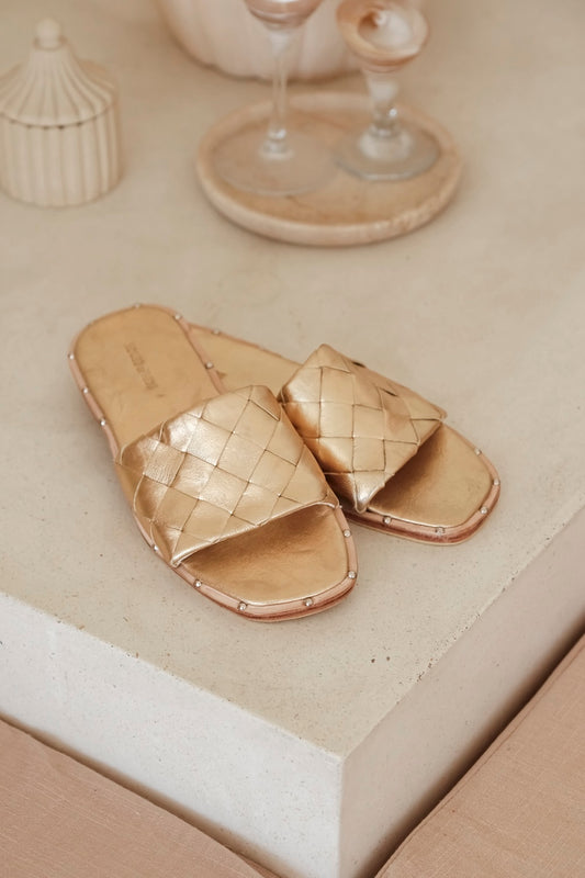 Gold woven leather slide sandal inspired by Bottega-style flat mules, handcrafted women’s leather slides in Australia