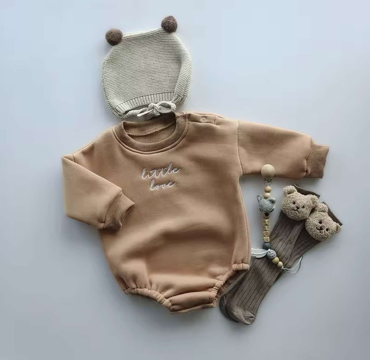 Burnt Orange Little Love Bubble Romper with cozy fleece lining and neutral embroidery.