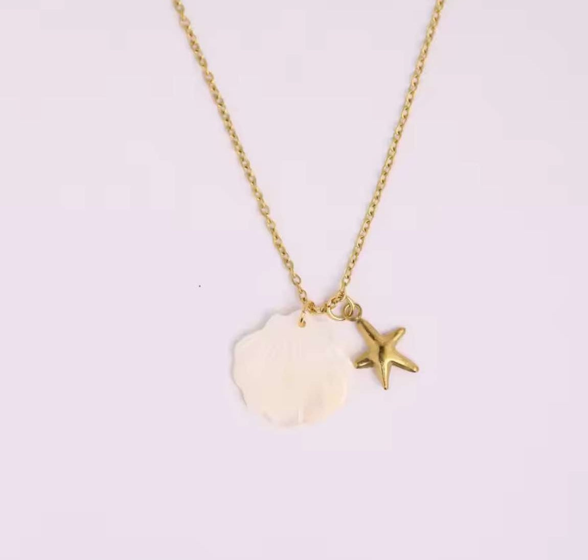 Celebrate summer with the Sea Turtle & Starfish Charm Necklace! Waterproof and durable, it’s perfect for bringing ocean vibes to everyday outfits or beach getaways