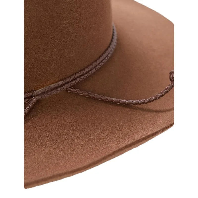 Close-up of Sundance Rancher wool hat showing the fine felt texture and brick-red colo