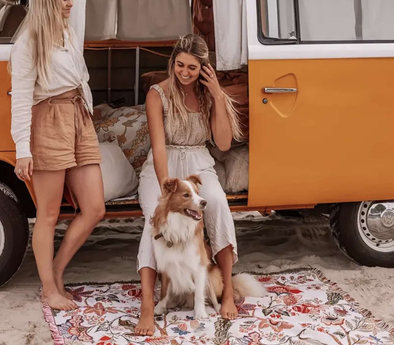 Close-up of earthy tones and floral patterns on the Floral Wanderer Boho Blanket, ideal for outdoor use.